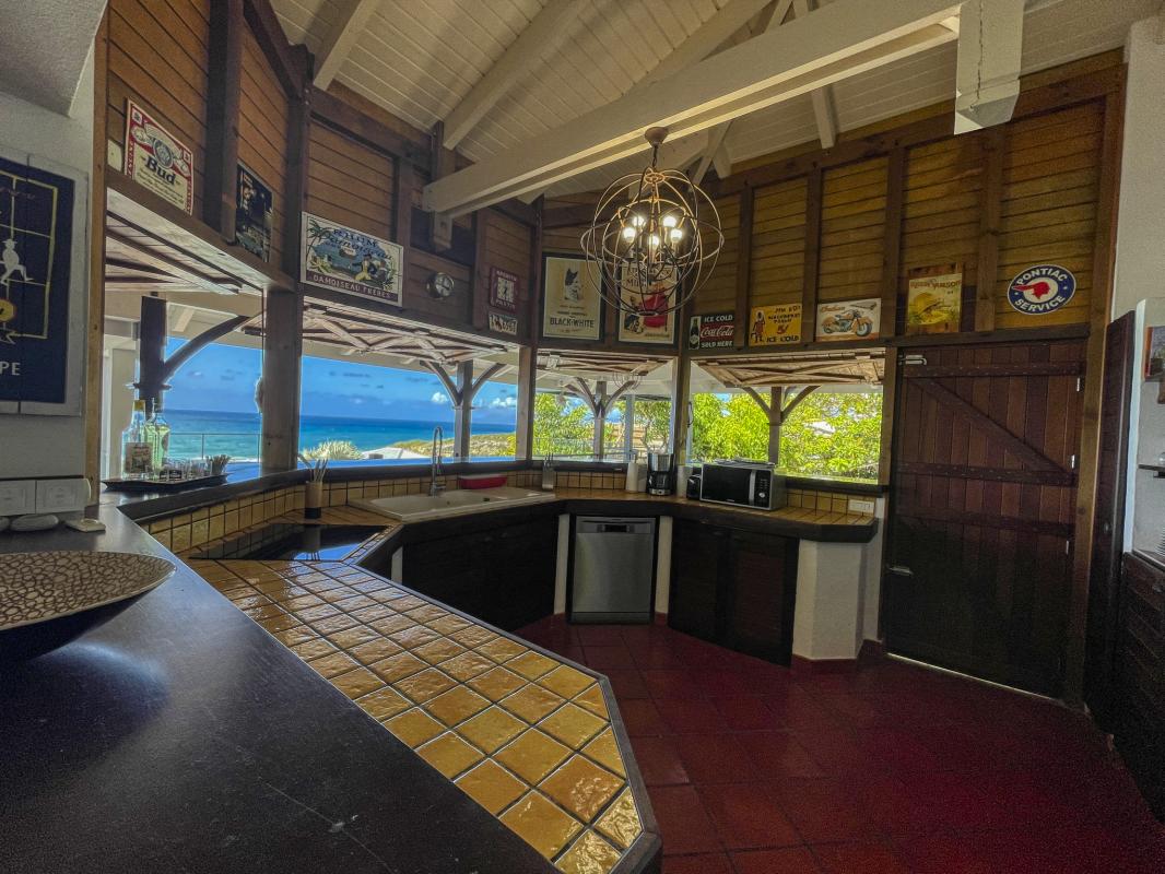 15 Location villa tropicale 5 chambres 10 personnes avec piscine et vue mer saint françois en guadeloupe - cuisine